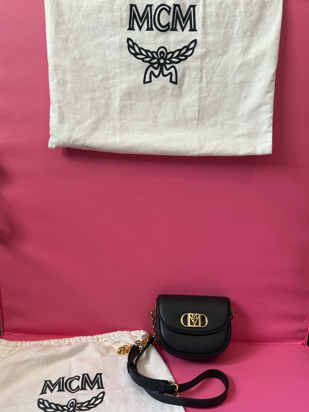 MCM Black Leather Crossbody Saddle Bag with Gold Logo